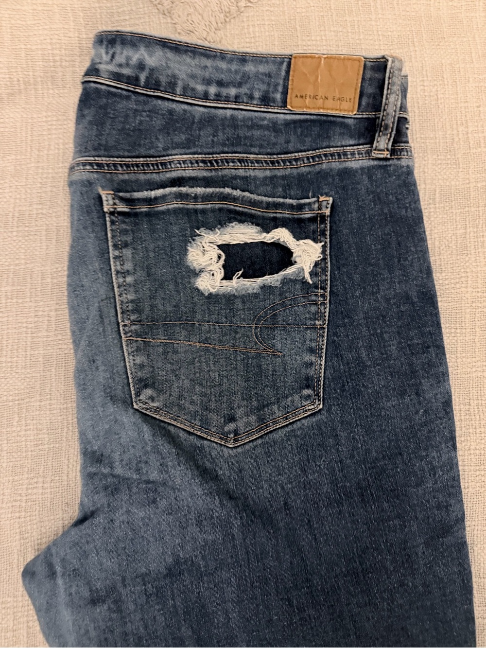 American Eagle Outfitters Women’s High-Rise Distressed Blue Jeans